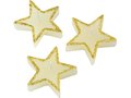 Three star-shaped candles