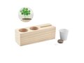 Wooden desk stand with clover seeds