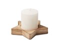 Candle on star wooden base