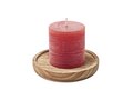 Candle on round wooden base