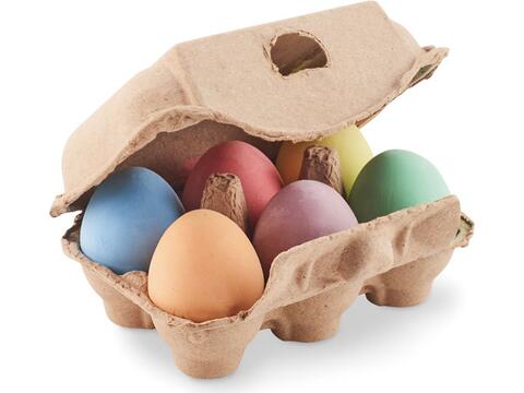 6 chalk eggs in a egg box